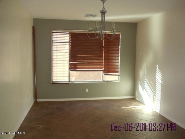 15236 West Boca Raton Road Surprise, AZ 85379 - Photo 3 of 18 a view of livingroom with window