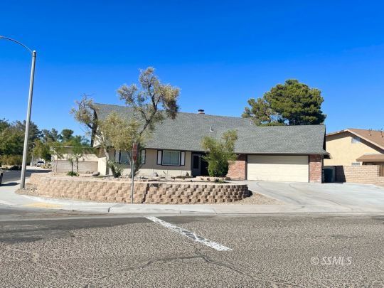 656 West Felspar Avenue Ridgecrest, CA 93555 - Photo 2 of 45 a view of a house with a outdoor space and porch