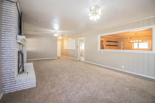 a view of empty room with windows