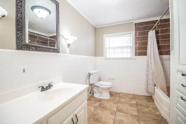 a bathroom with a sink and a toilet