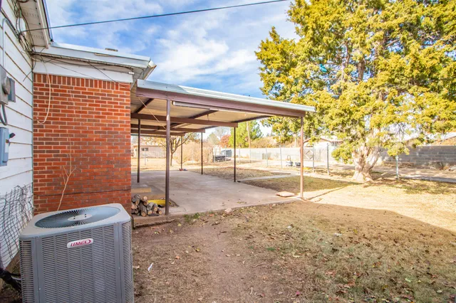 a house with trees in front of it
