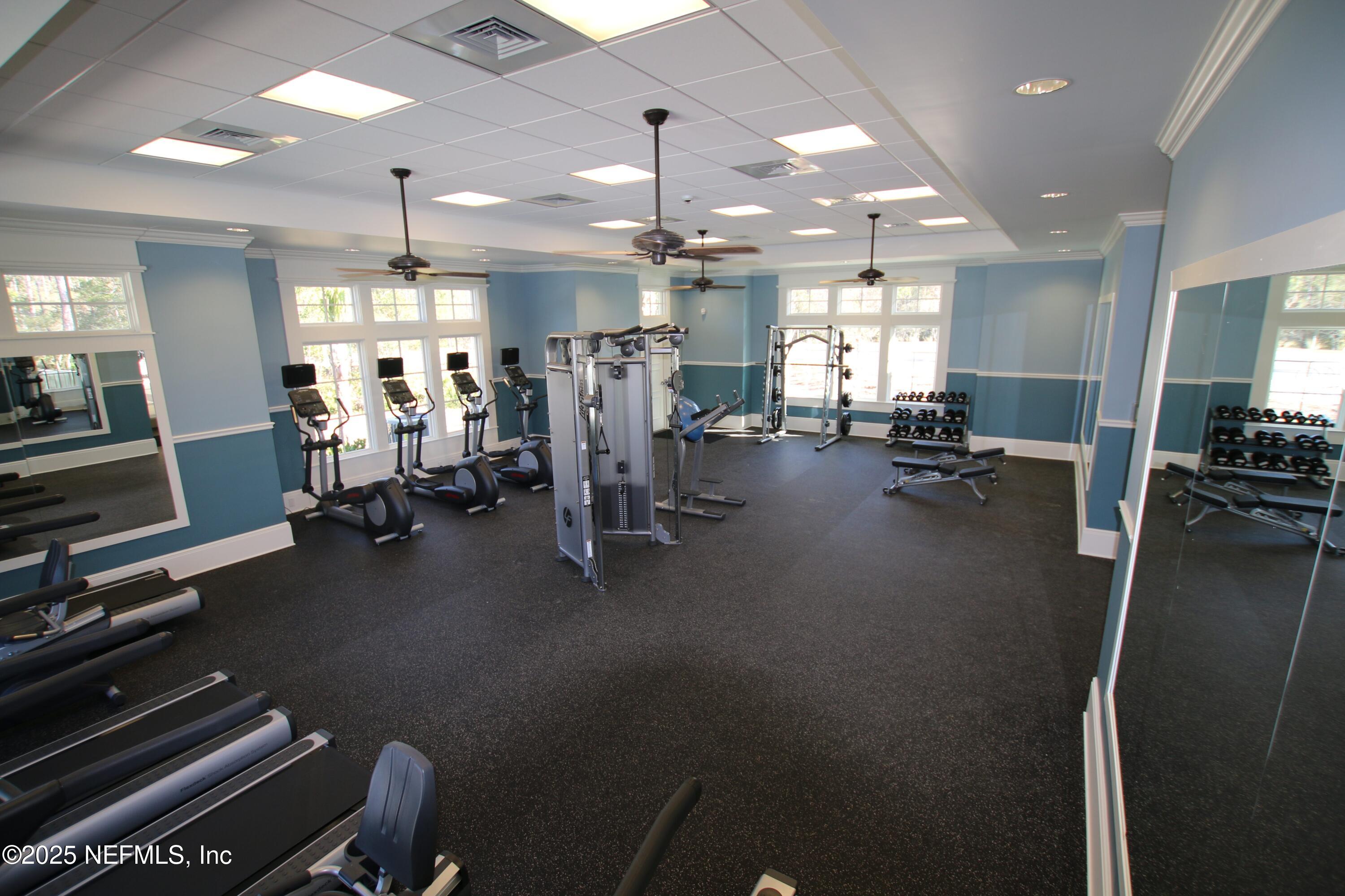 76024 Estuary Way Yulee, FL 32097 - Photo 19 of 42 a view of a room with gym equipment