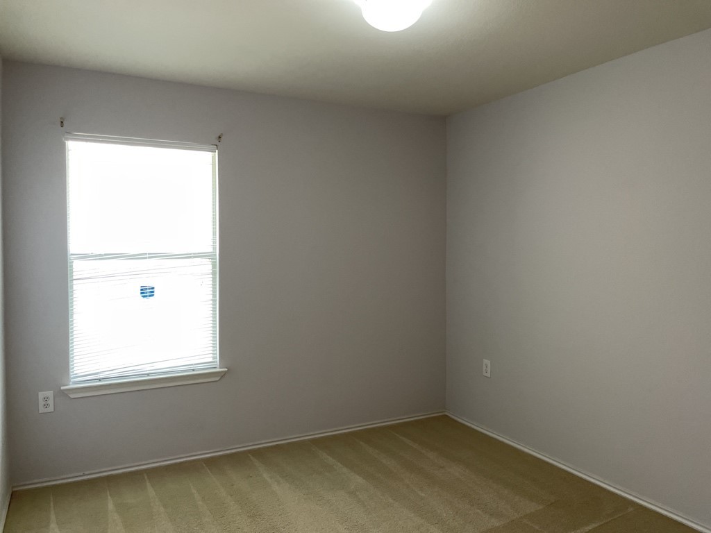 9005 Sun Shower Bend Austin, TX 78724 - Photo 18 of 20 an empty room with a window