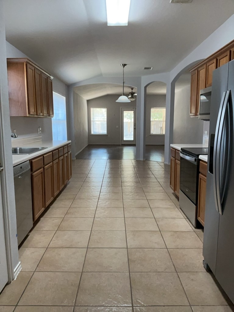 9005 Sun Shower Bend Austin, TX 78724 - Photo 6 of 20 Kitchen overlooking the living area