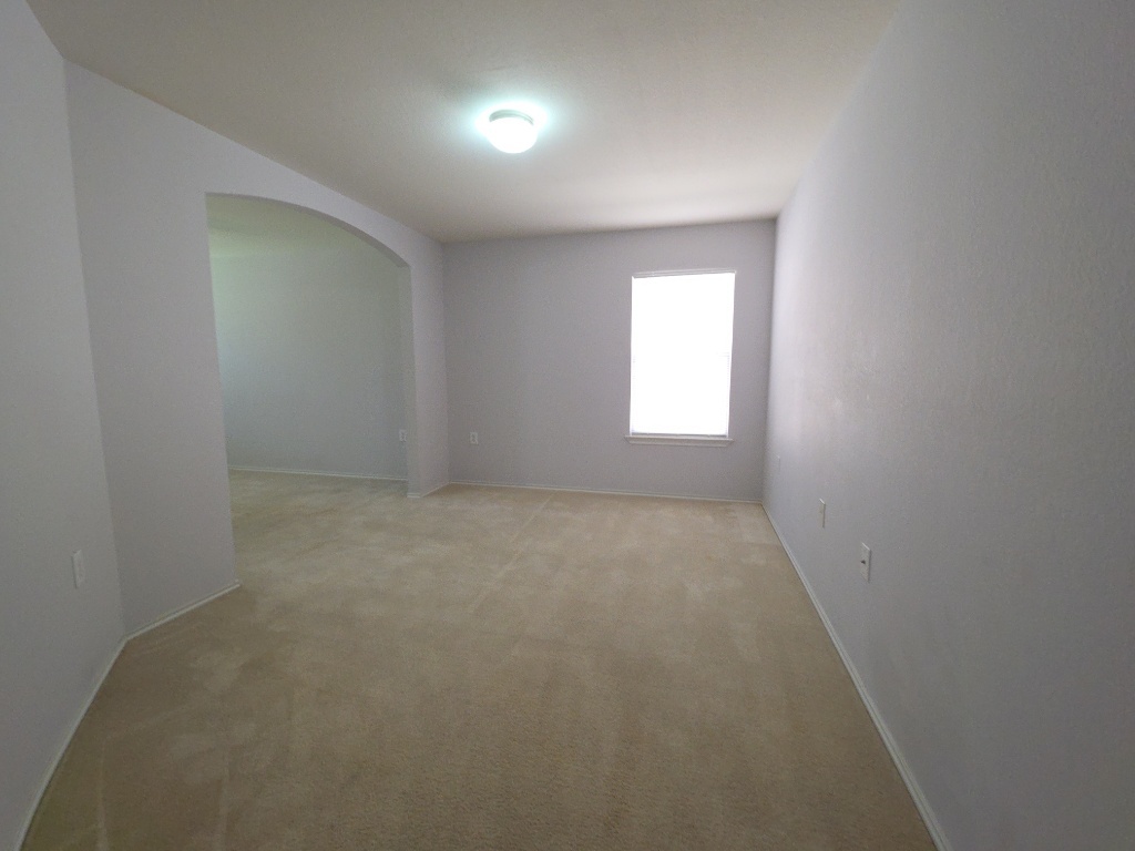 9005 Sun Shower Bend Austin, TX 78724 - Photo 10 of 20 an empty room with a window
