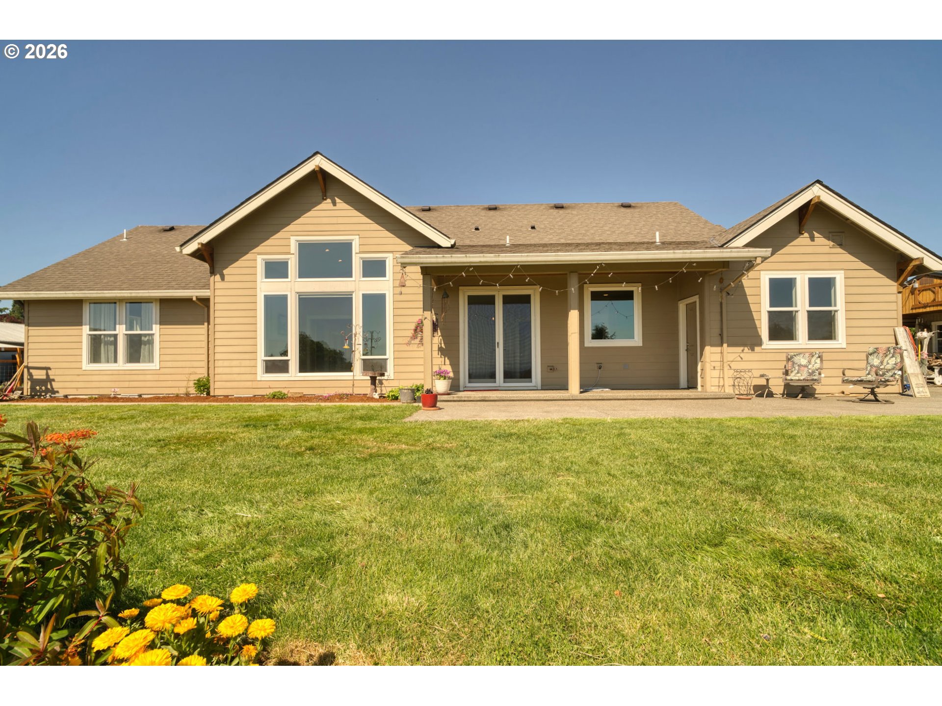 33058 Church Road Warren, OR 97053 - Photo 25 of 45 a front view of a house with a yard