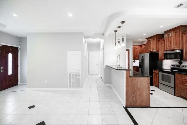 a view of swimming pool with seating area