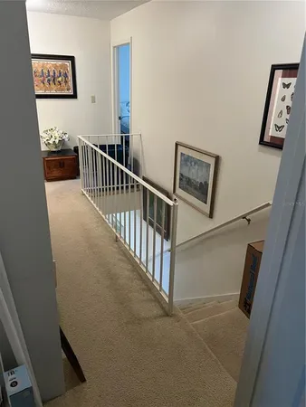 a view of hallway with stairs