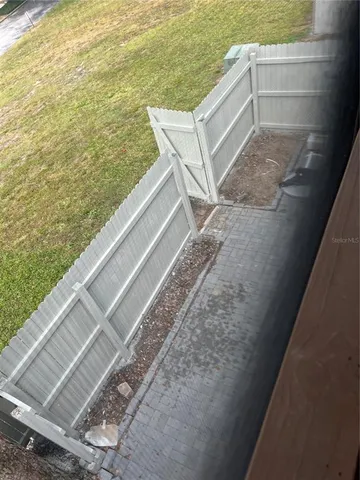 a view of a balcony with an outdoor space