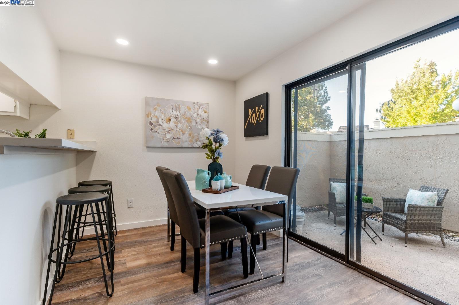 601 Palomino Drive, Unit C Pleasanton, CA 94566 - Photo 12 of 41 a view of a dining room with furniture window and outside view