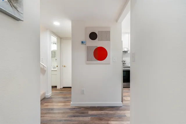 a view of a hallway with painted walls