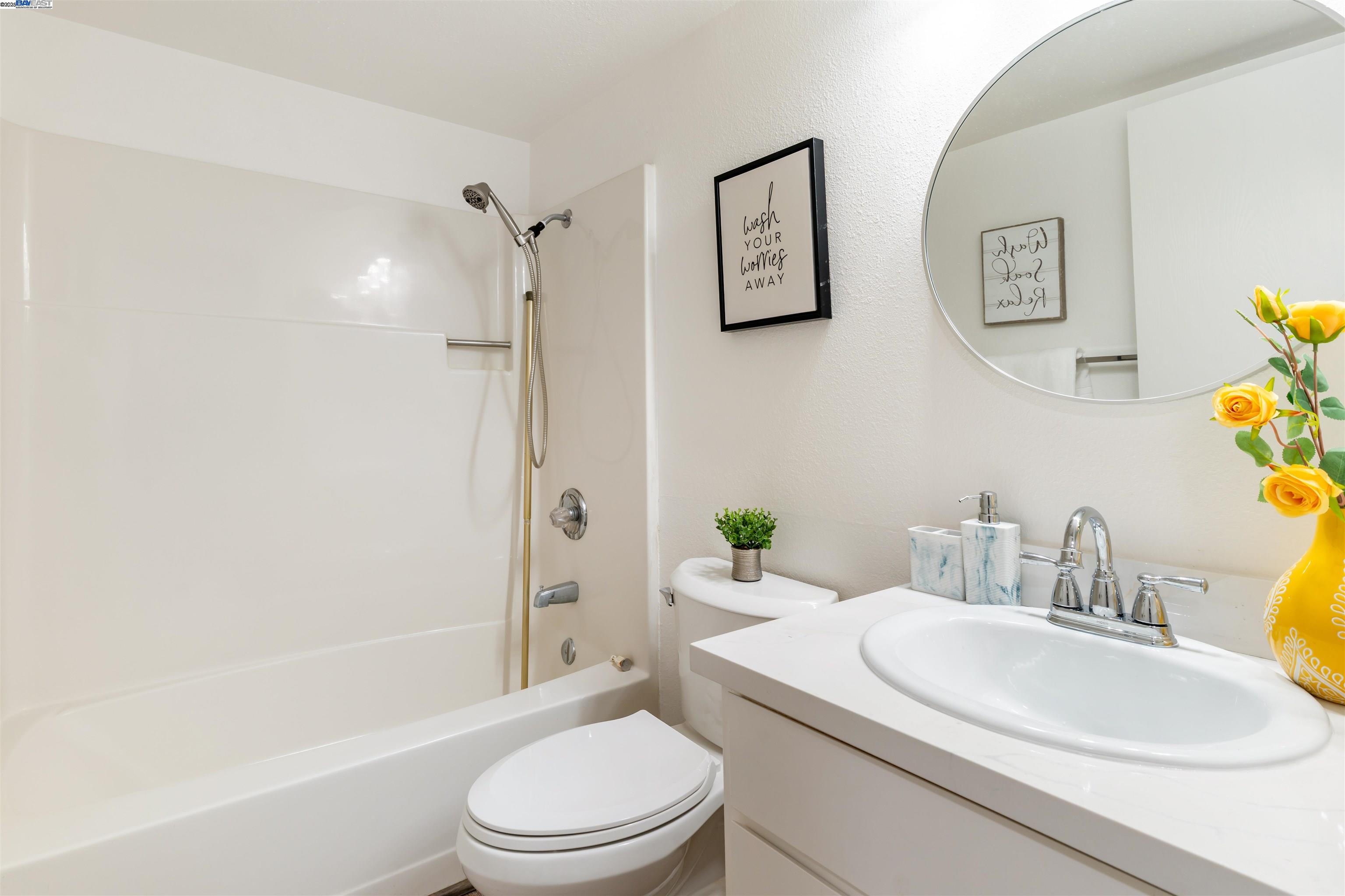 601 Palomino Drive, Unit C Pleasanton, CA 94566 - Photo 29 of 41 a bathroom with a sink toilet and shower