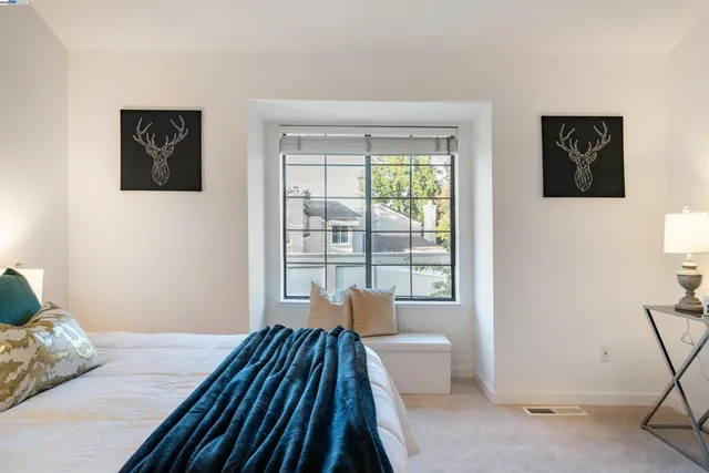 a bathroom with a sink double vanity and a mirror