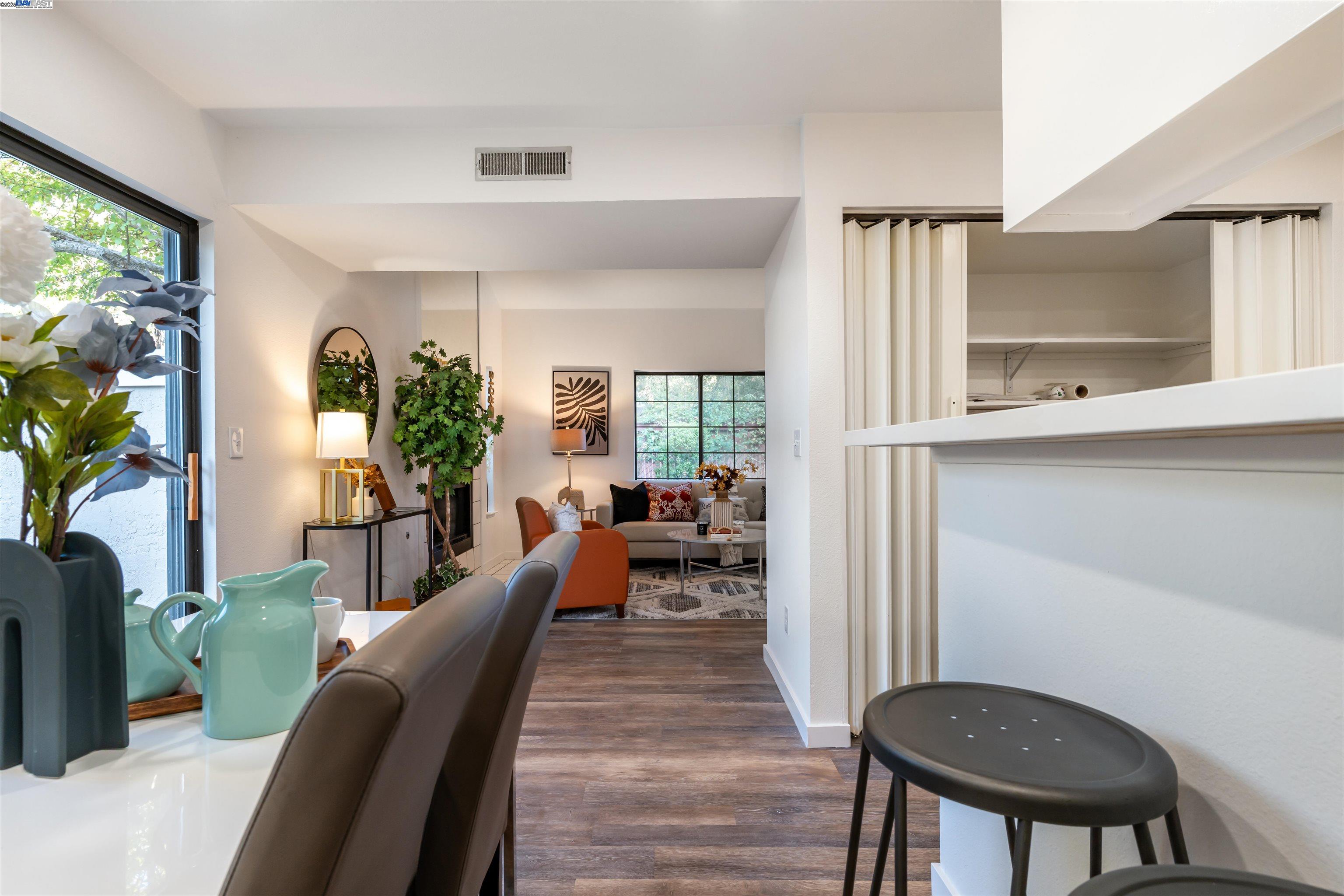 601 Palomino Drive, Unit C Pleasanton, CA 94566 - Photo 10 of 41 a living room with furniture and a table