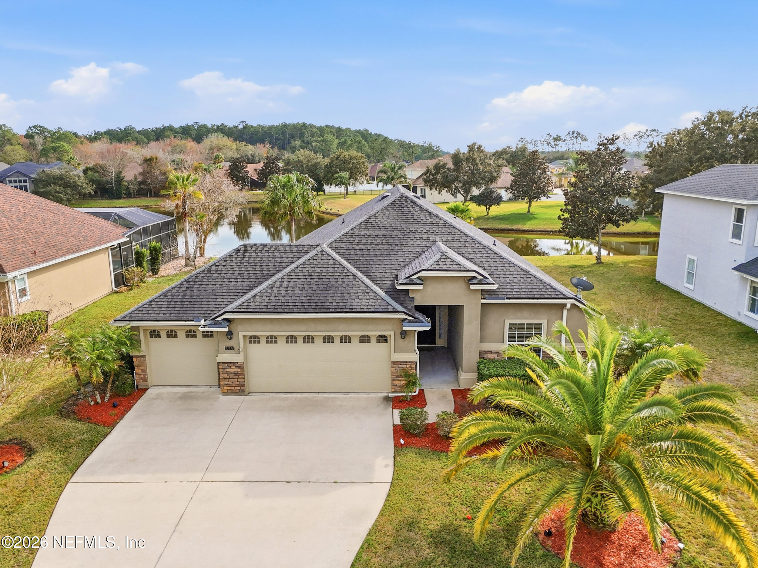 374 Porta Rosa Circle St. Augustine, FL 32092 - Photo 1 of 47 a aerial view of a house with a yard