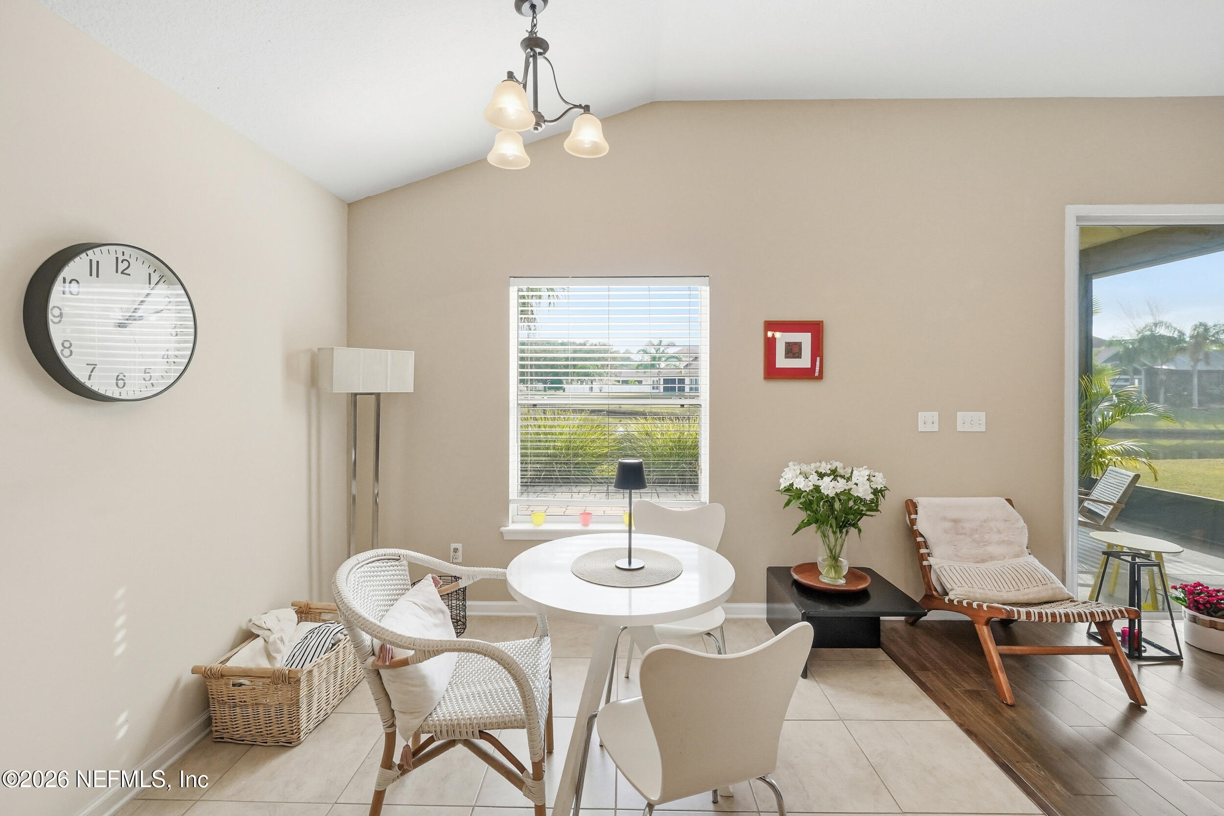 374 Porta Rosa Circle St. Augustine, FL 32092 - Photo 12 of 47 a view of a dining room with furniture window and wooden floor