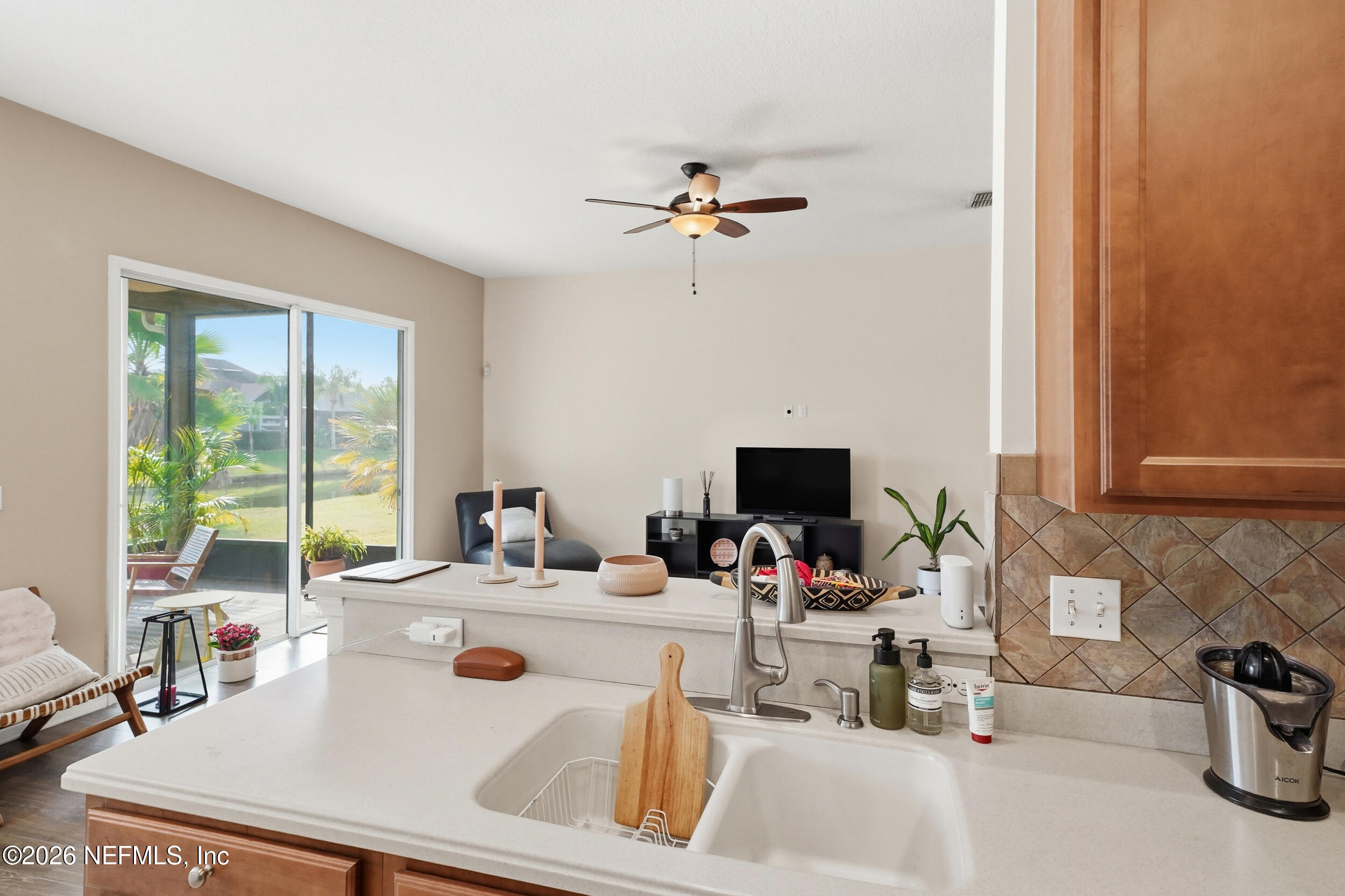374 Porta Rosa Circle St. Augustine, FL 32092 - Photo 17 of 47 a living room with furniture and a flat screen tv