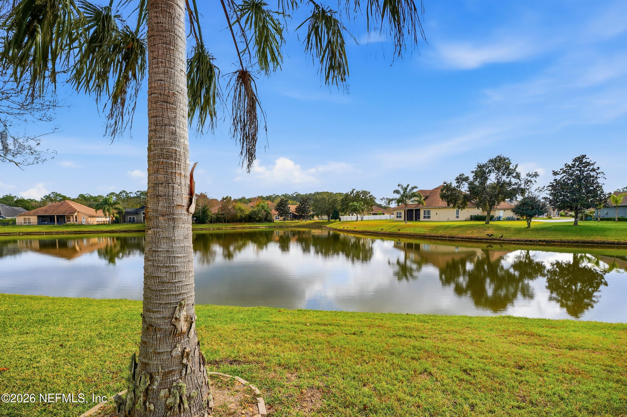 374 Porta Rosa Circle St. Augustine, FL 32092 - Photo 32 of 47 a view of a lake