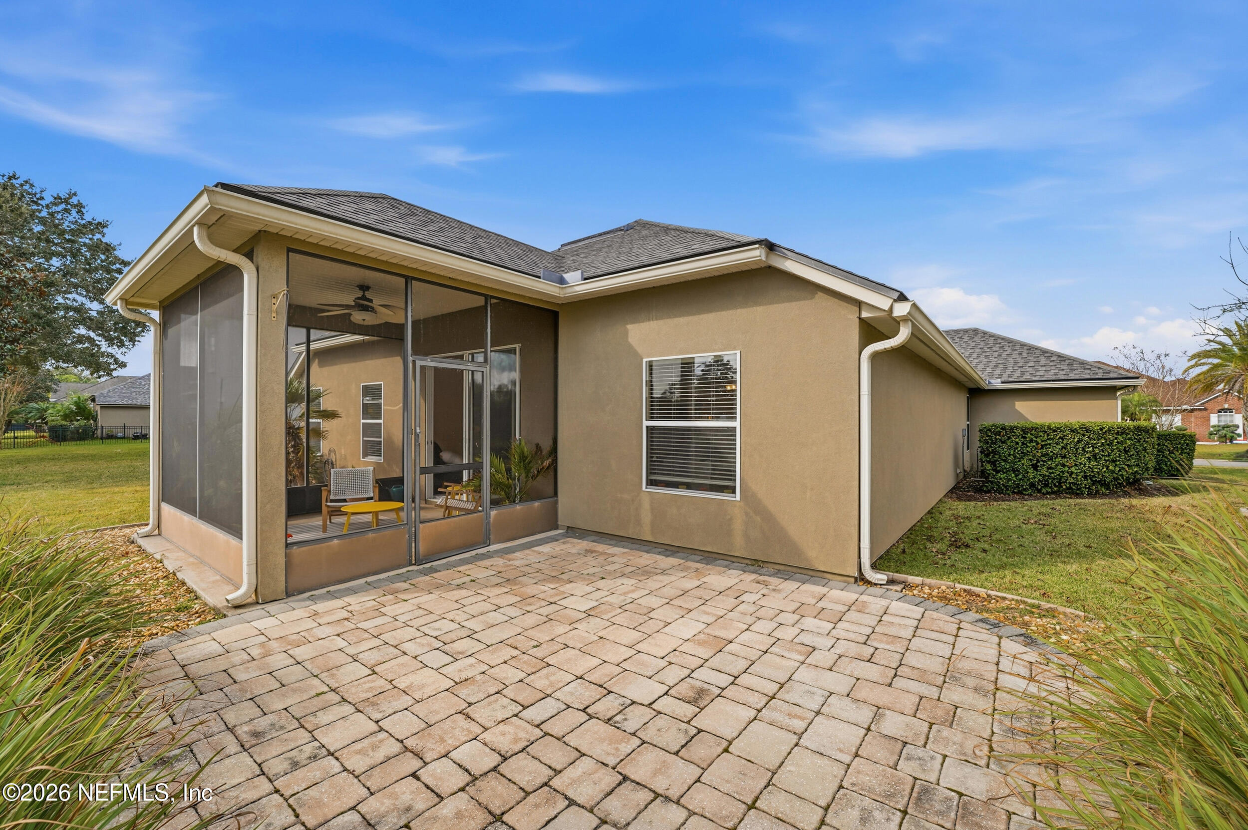 374 Porta Rosa Circle St. Augustine, FL 32092 - Photo 33 of 47 a yellow house with a outdoor space