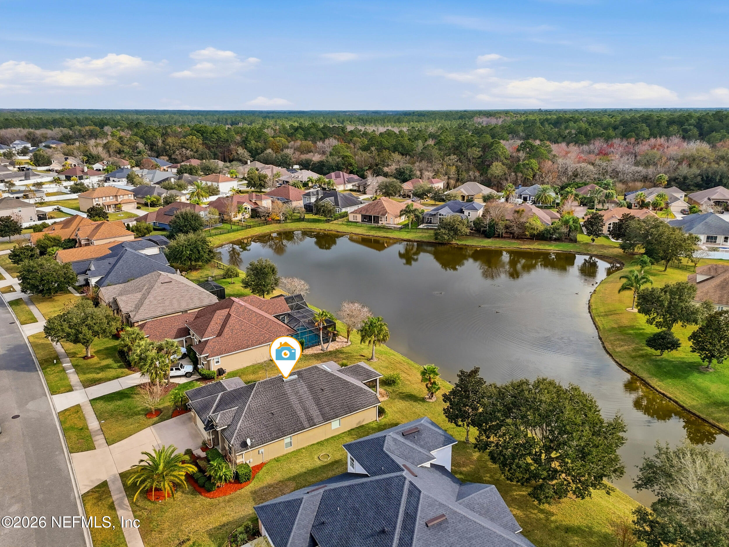374 Porta Rosa Circle St. Augustine, FL 32092 - Photo 39 of 47 an aerial view of a houses with a lake view
