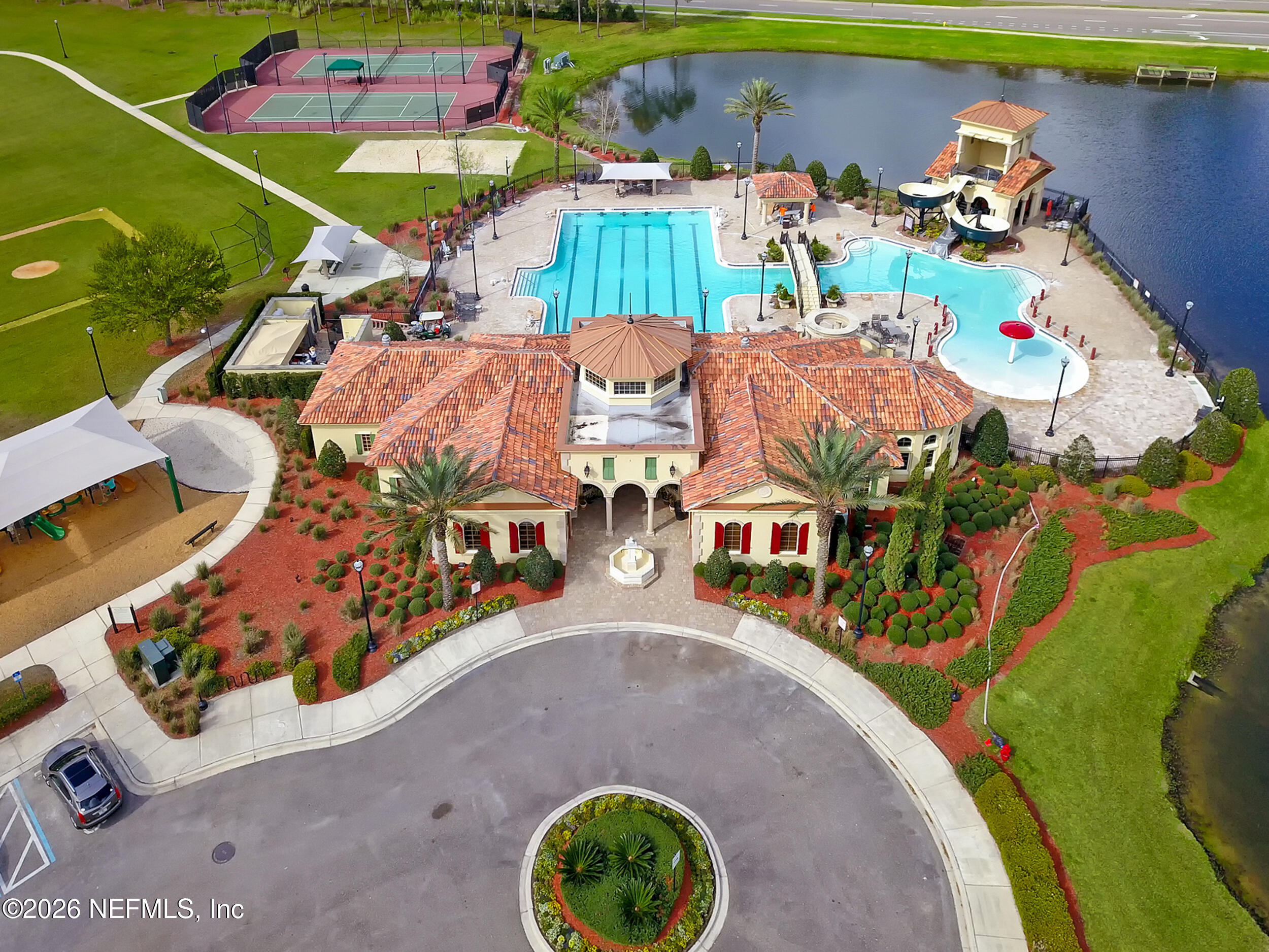 374 Porta Rosa Circle St. Augustine, FL 32092 - Photo 43 of 47 an aerial view of a house with a swimming pool patio and outdoor seating