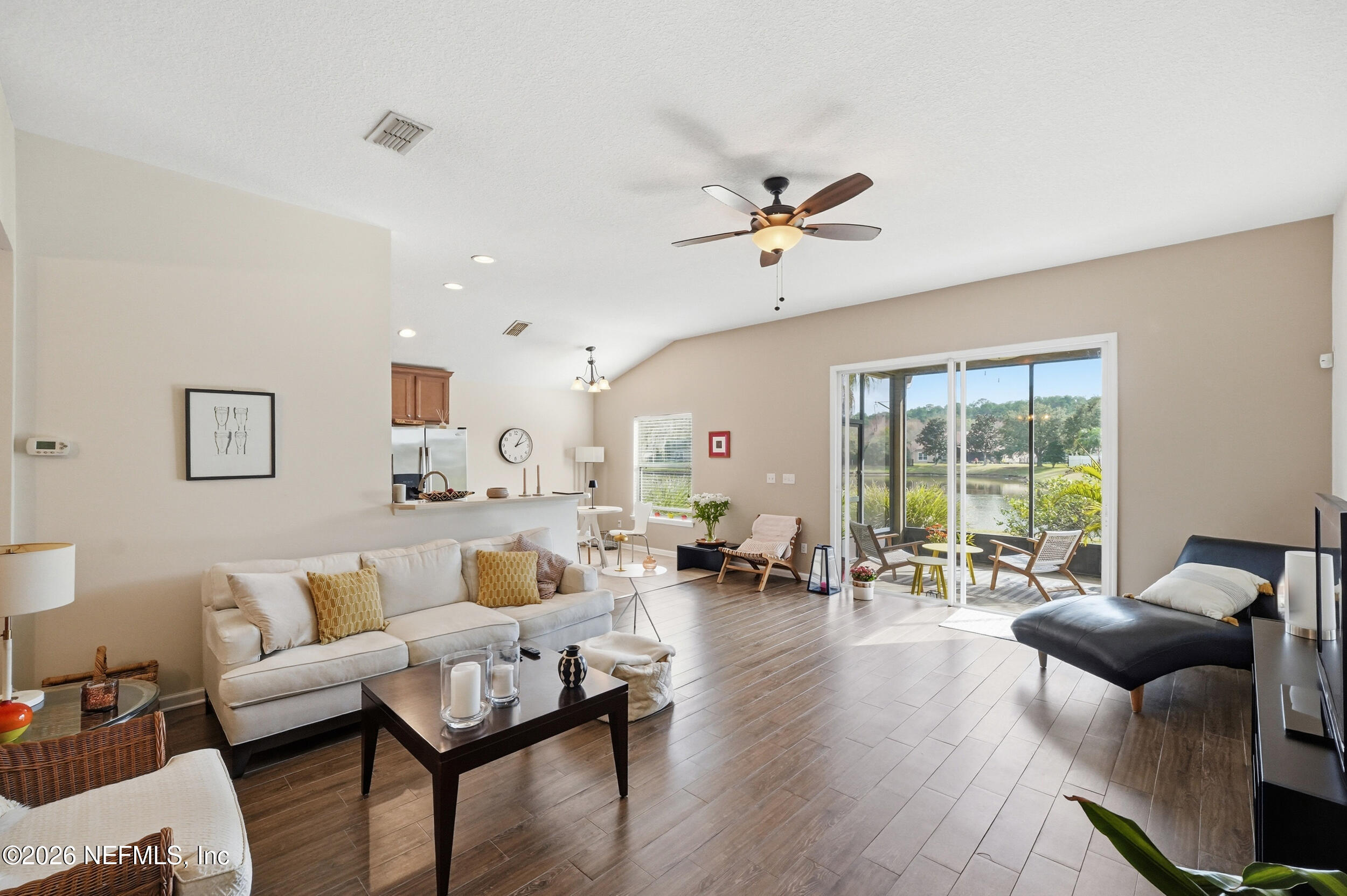 374 Porta Rosa Circle St. Augustine, FL 32092 - Photo 6 of 47 a living room with furniture or couch and a large window
