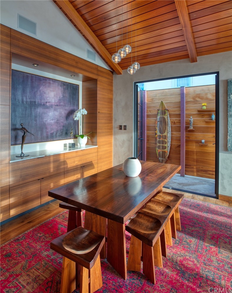 2804 The Strand Manhattan Beach, CA 90266 - Photo 14 of 51 a view of a dining room with furniture and wooden floor