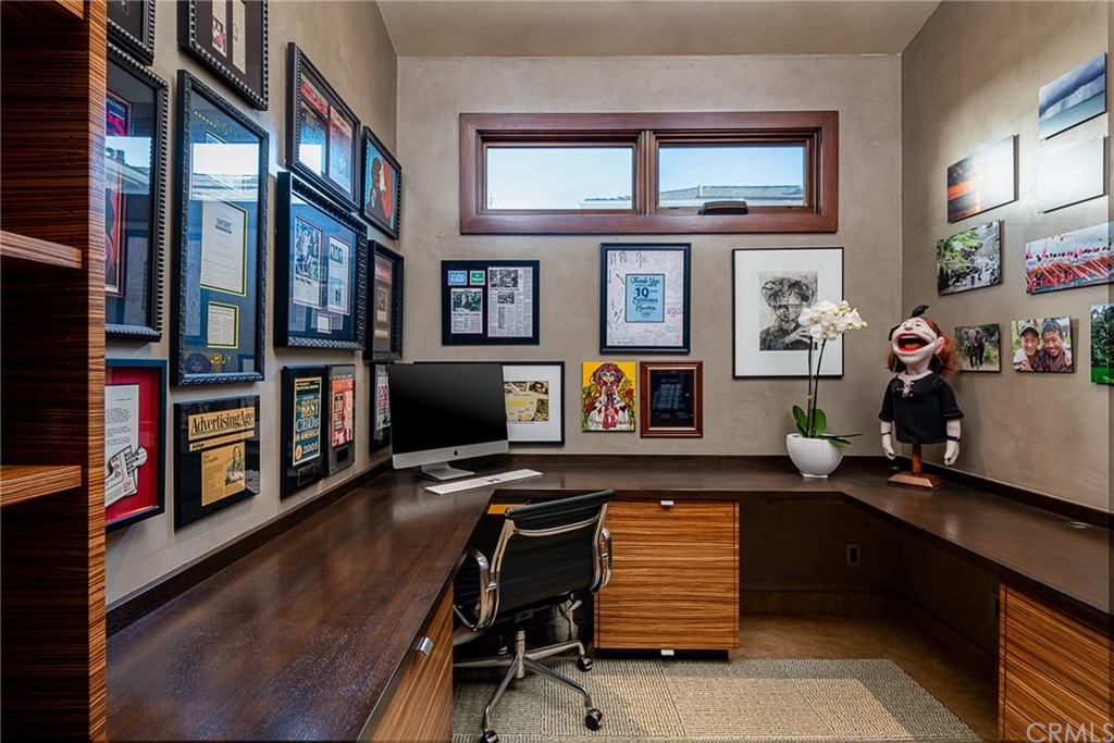 2804 The Strand Manhattan Beach, CA 90266 - Photo 25 of 51 a room with furniture and a fireplace
