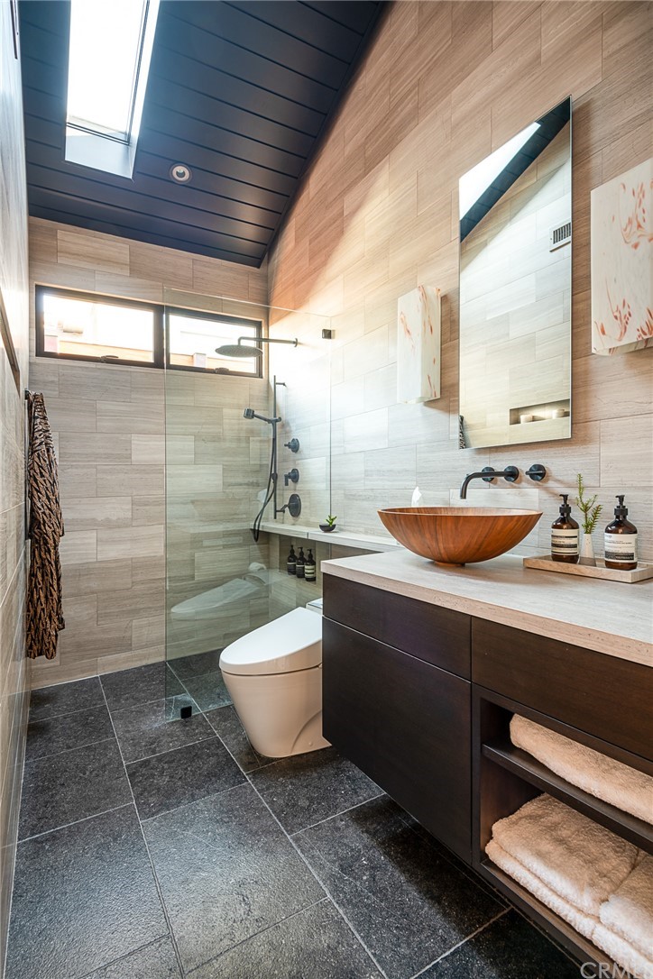 2804 The Strand Manhattan Beach, CA 90266 - Photo 27 of 51 a bathroom with a sink a toilet and mirror