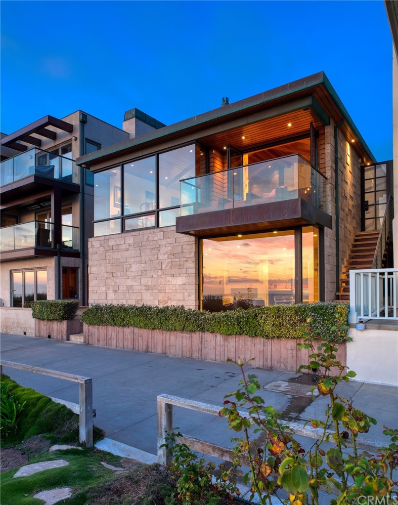 2804 The Strand Manhattan Beach, CA 90266 - Photo 3 of 51 a front view of a house with garden