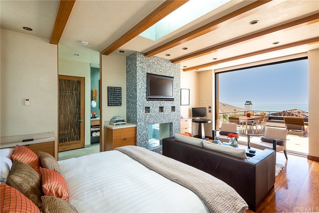 2804 The Strand Manhattan Beach, CA 90266 - Photo 38 of 51 a bedroom with furniture and a flat screen tv