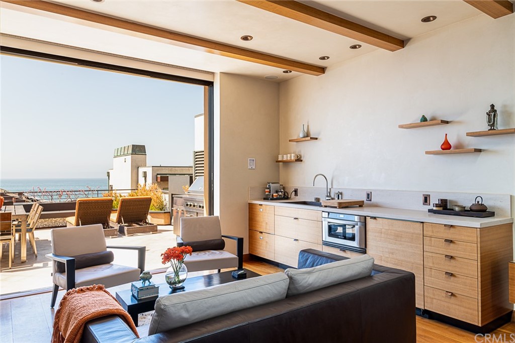 2804 The Strand Manhattan Beach, CA 90266 - Photo 40 of 51 a living room with furniture and decor