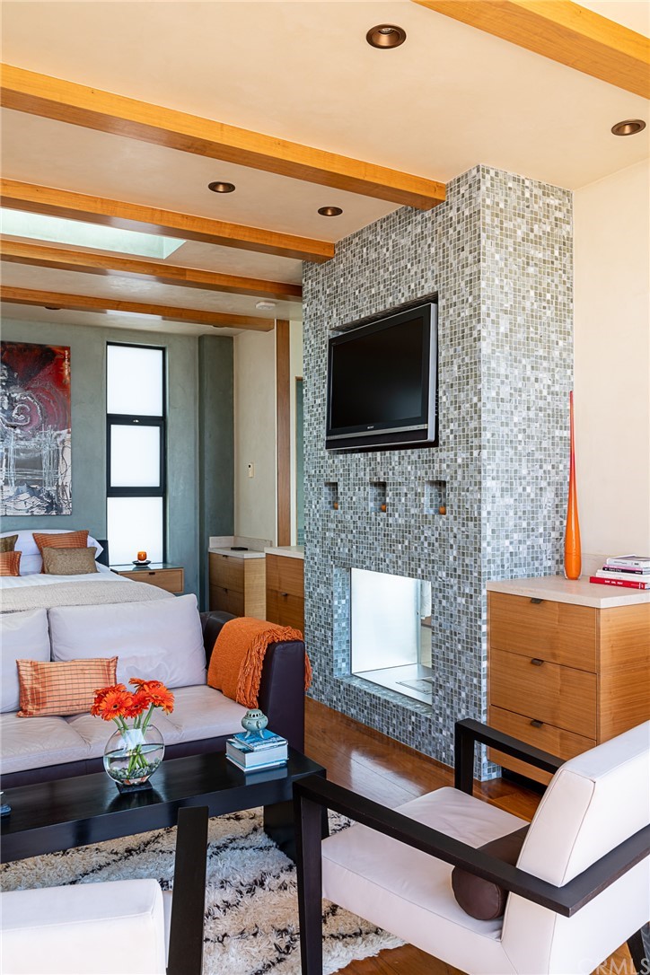 2804 The Strand Manhattan Beach, CA 90266 - Photo 42 of 51 a living room with furniture and a flat screen tv