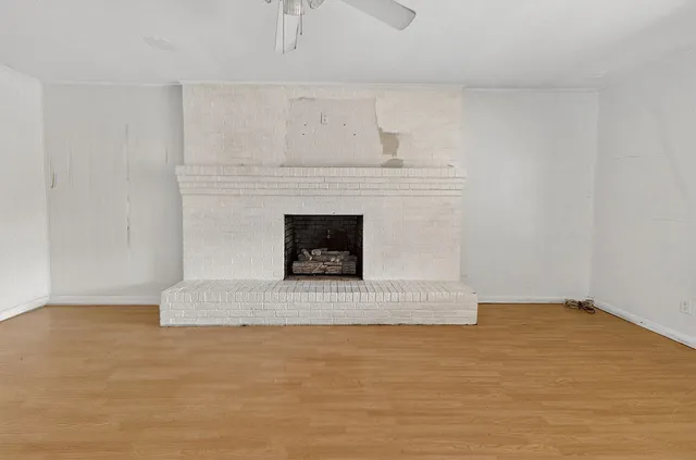 a kitchen with sink cabinets and window
