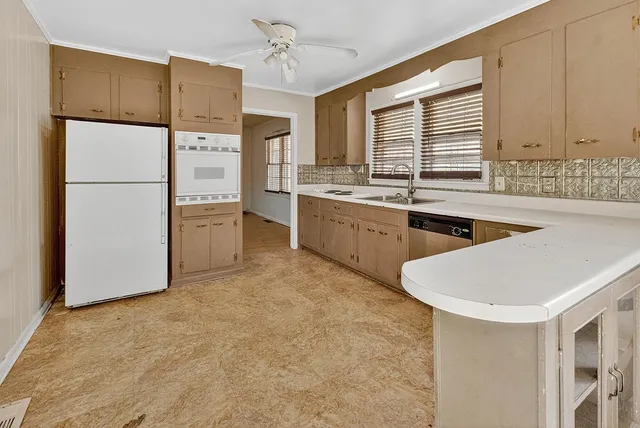 a view of a hallway with wooden floor and closet