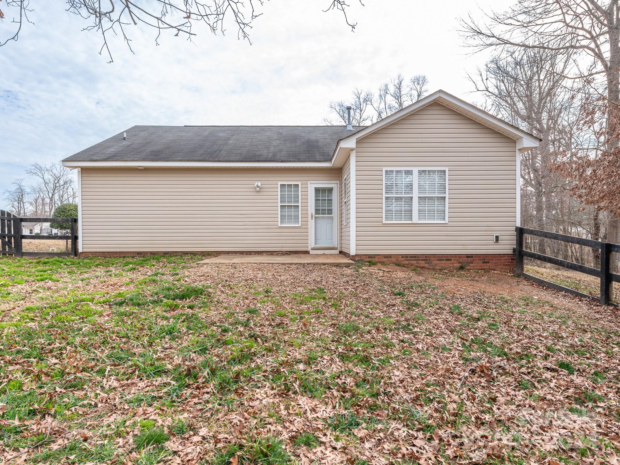 401 Funderburk Road Wingate, NC 28174 - Photo 27 of 36 front view of a house with a yard