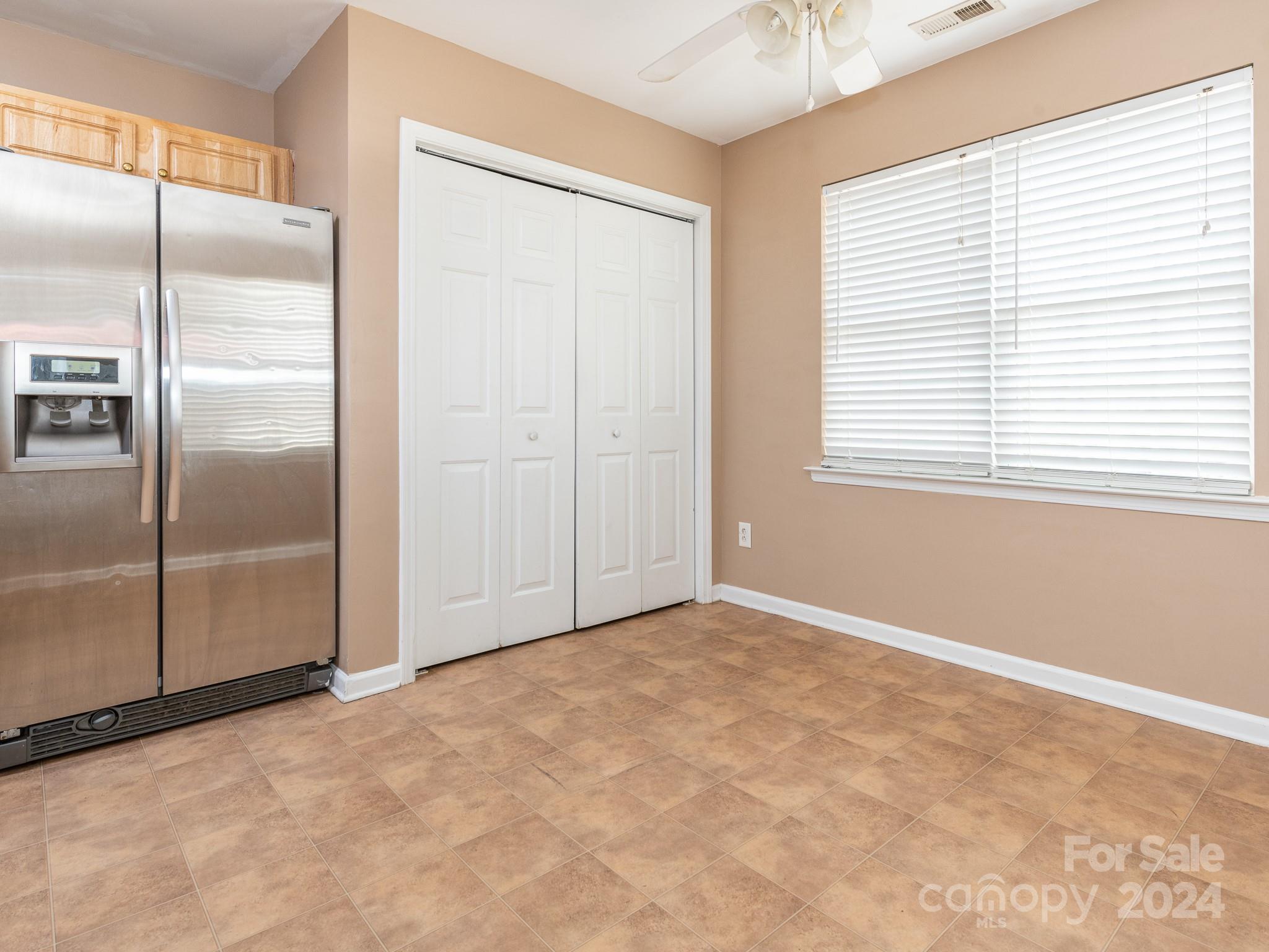 401 Funderburk Road Wingate, NC 28174 - Photo 34 of 36 an empty room with windows and closet