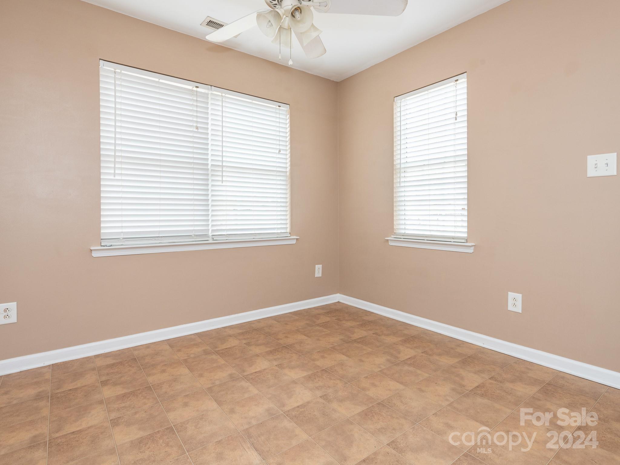 401 Funderburk Road Wingate, NC 28174 - Photo 4 of 36 an empty room with a window