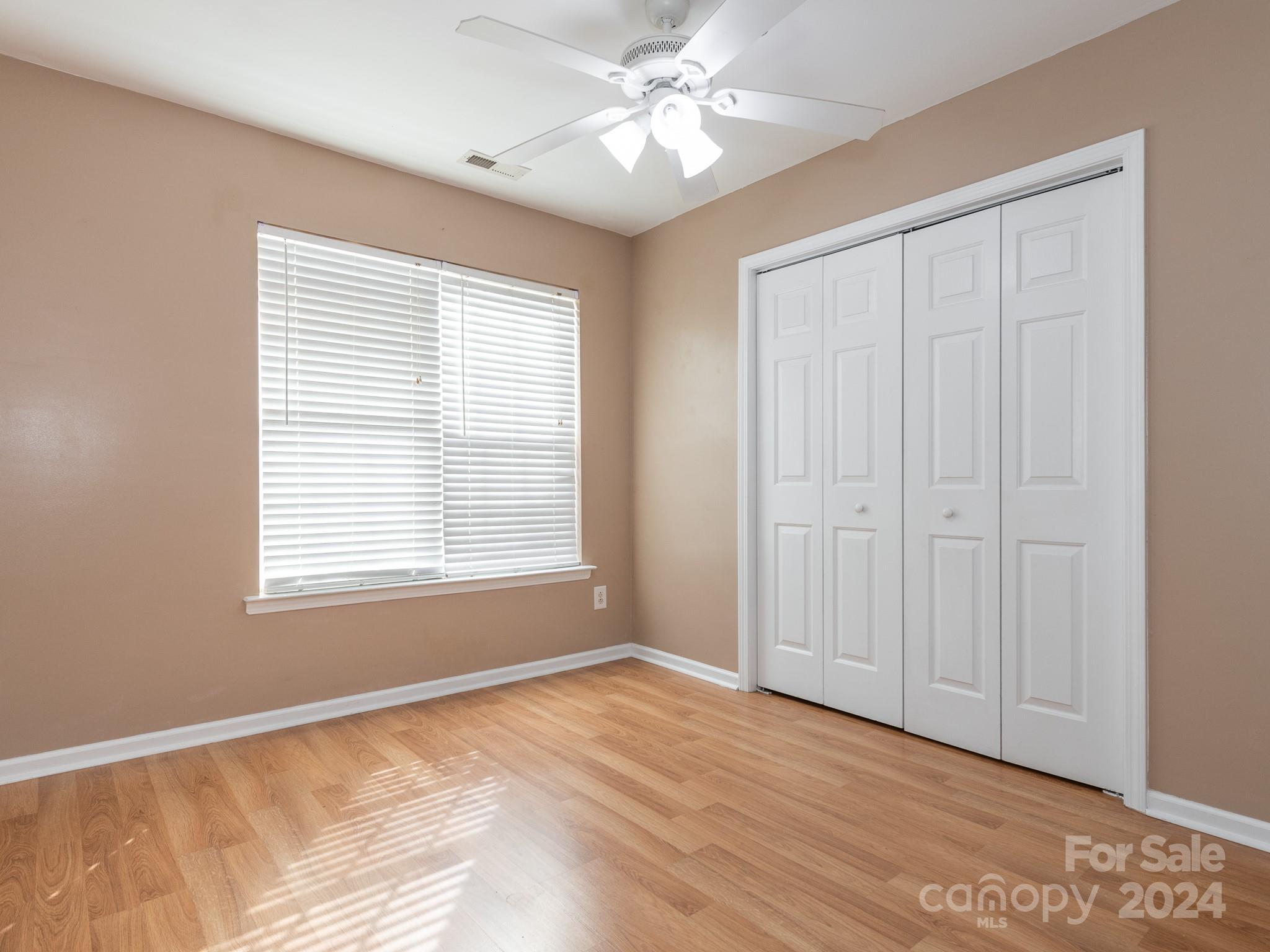 401 Funderburk Road Wingate, NC 28174 - Photo 7 of 36 a view of an empty room with a window