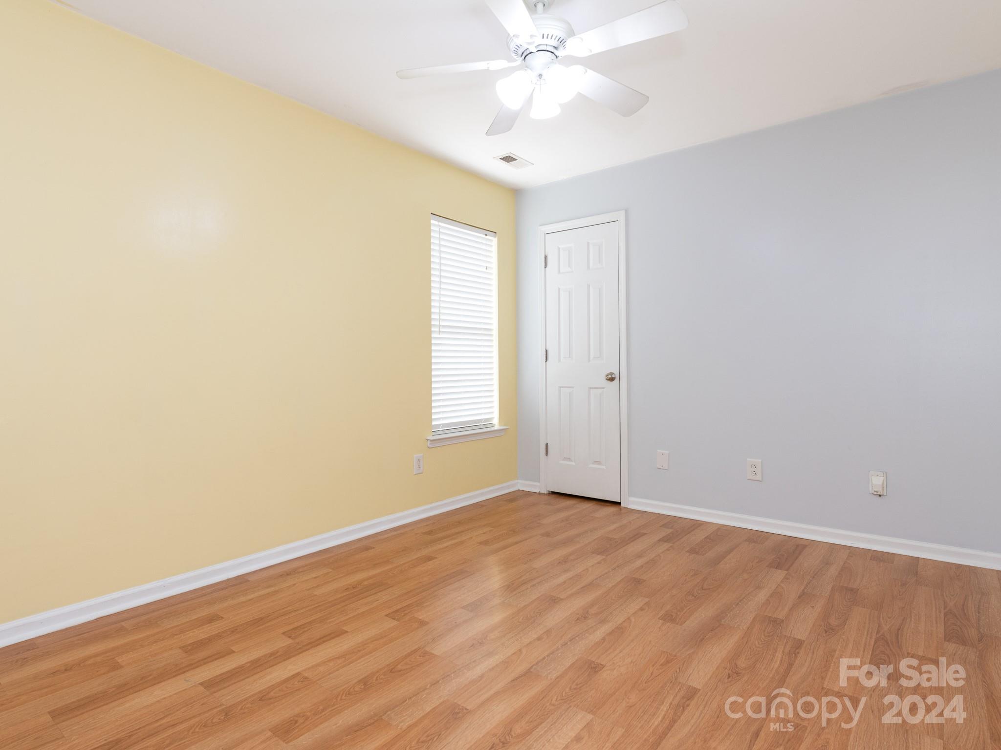 401 Funderburk Road Wingate, NC 28174 - Photo 9 of 36 a view of an empty room with wooden floor