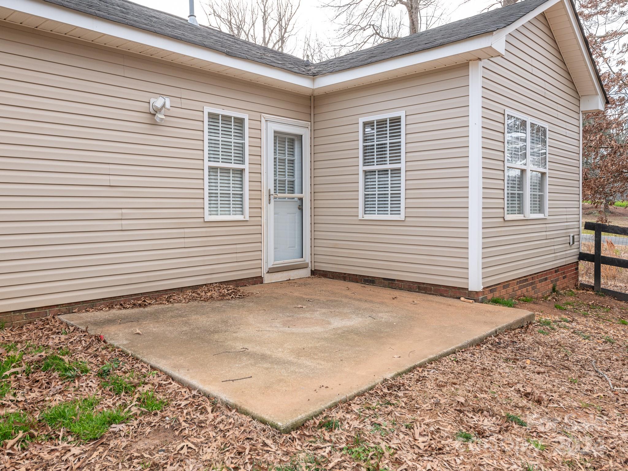 401 Funderburk Road Wingate, NC 28174 - Photo 10 of 36 a view of a house with a white house