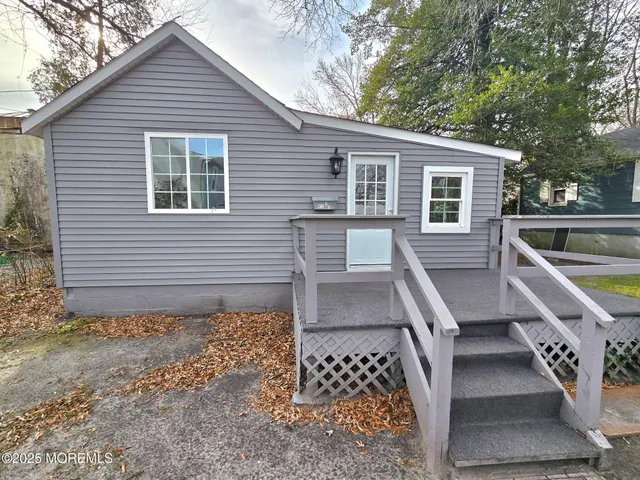 a house view with a backyard space