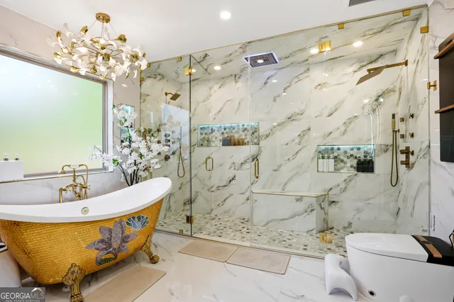 a spacious bathroom with a bathtub and shower