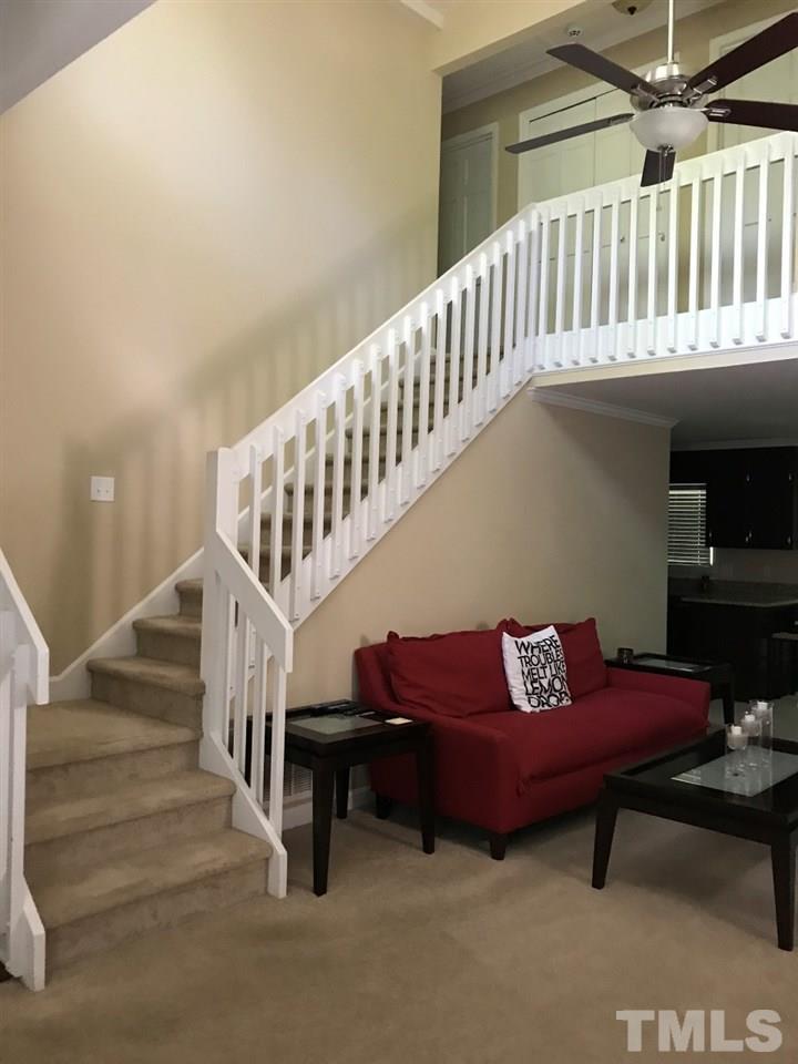 7819 Breckon Way Raleigh, NC 27615 - Photo 1 of 5 Stairway leads to 3 bedrooms and 2 full baths.