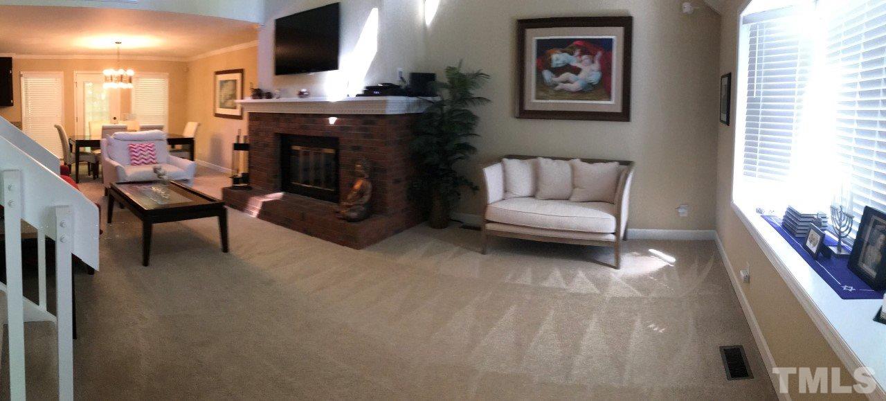 7819 Breckon Way Raleigh, NC 27615 - Photo 5 of 5 Beautiful open floor plan for the living room and formal dining room.