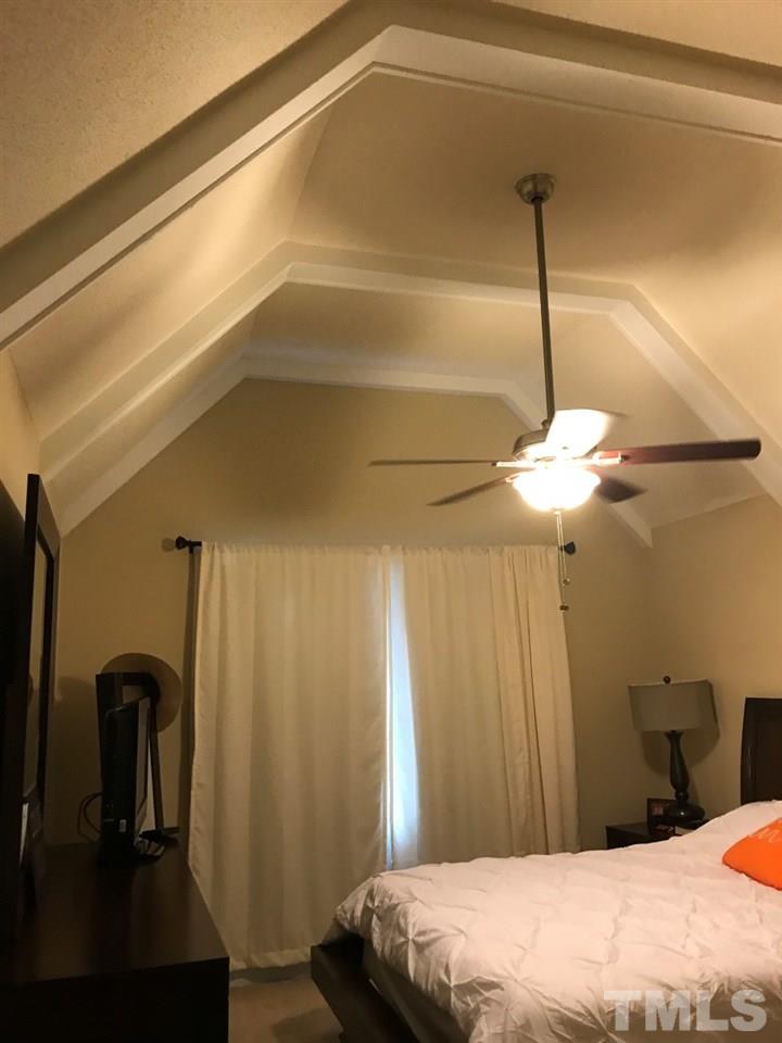 7819 Breckon Way Raleigh, NC 27615 - Photo 4 of 5 Master bedroom features cathedral ceiling.