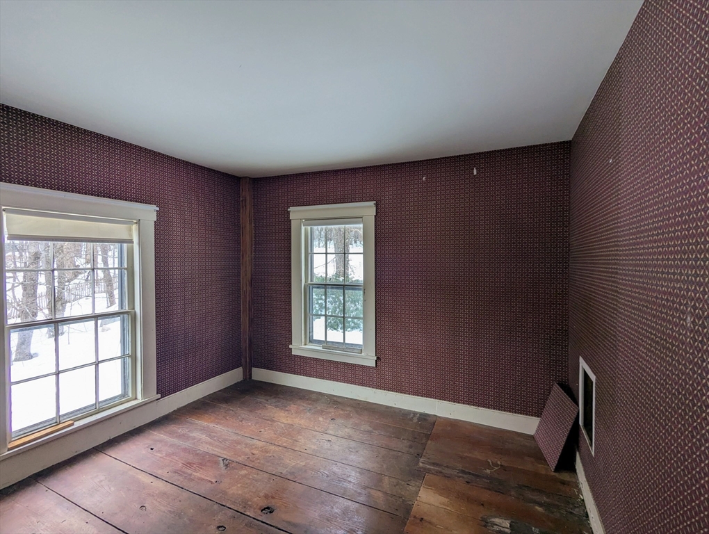 49 Enfield Road Pelham, MA 01002 - Photo 20 of 34 a view of an empty room with a window