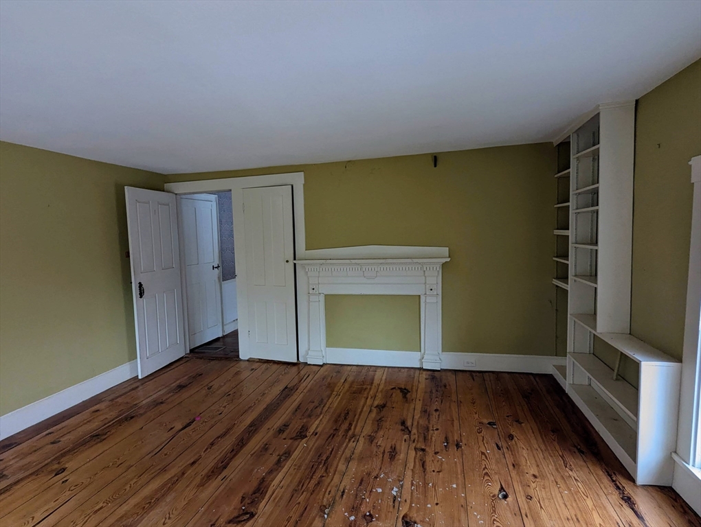 49 Enfield Road Pelham, MA 01002 - Photo 25 of 34 a view of empty room with wooden floor