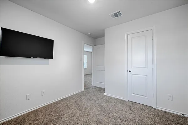 a view of a livingroom with a flat screen tv