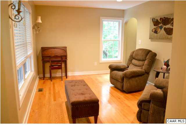 3 Zephyr Road Palmyra, VA 22963 - Photo 11 of 25 a living room with furniture and a floor to ceiling window